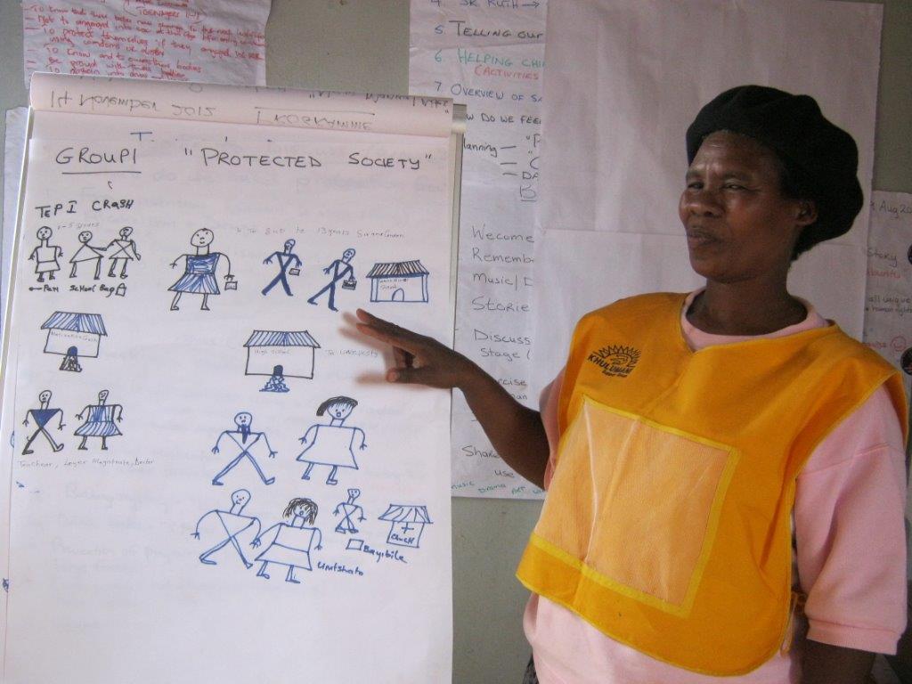 A Gogo presents her Group's discussion findings at the final workshop