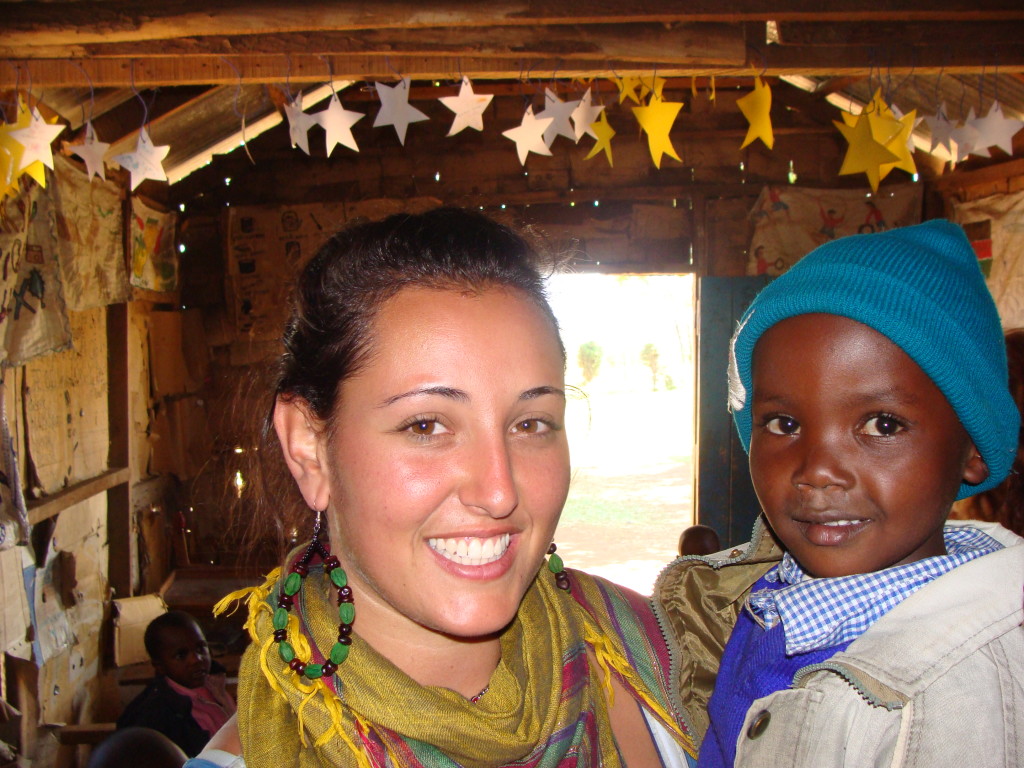  Genna at the original kindergarten, with one of the students.