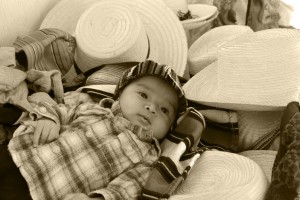 Baby in the hat stall