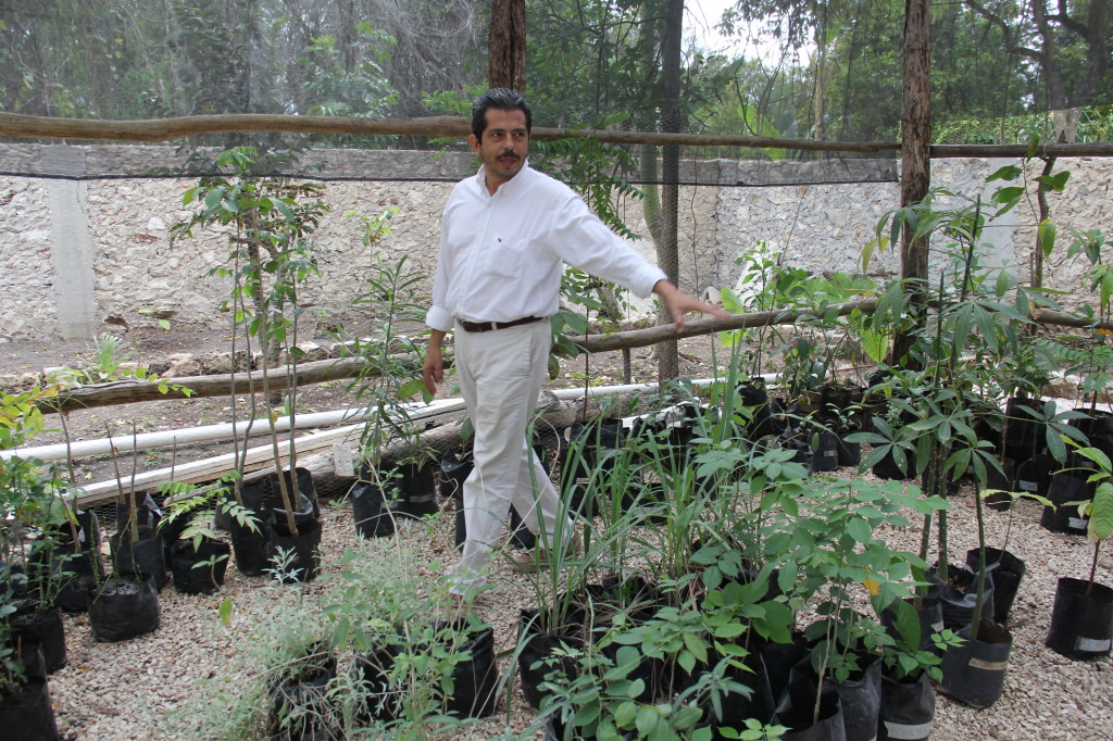 Virgilio Gomez in the community botanical garden
