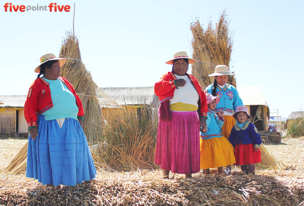 The Island women and children welcome us to their homes