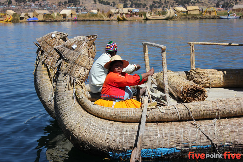 The Island chief and his wife row, row row the boat