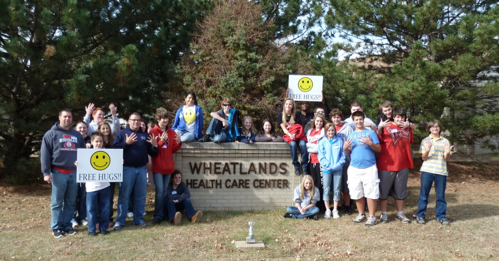 One Spark kids at a nursing home Sparking the residents.