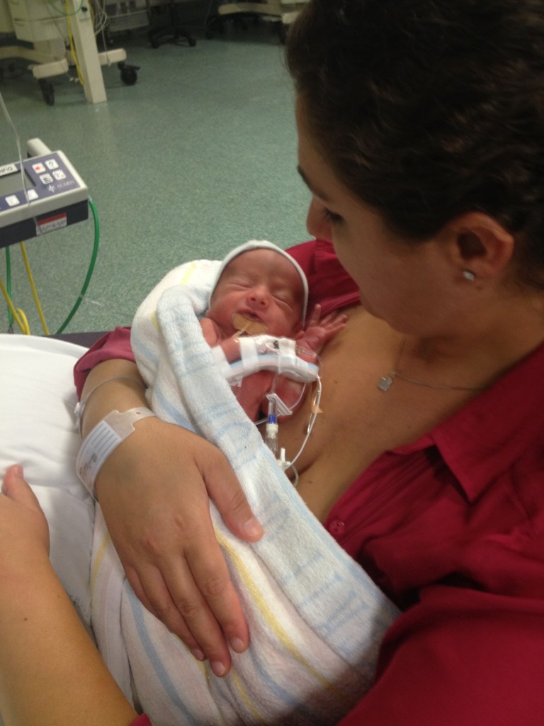 Rebecca, holding Lucas in NICU.