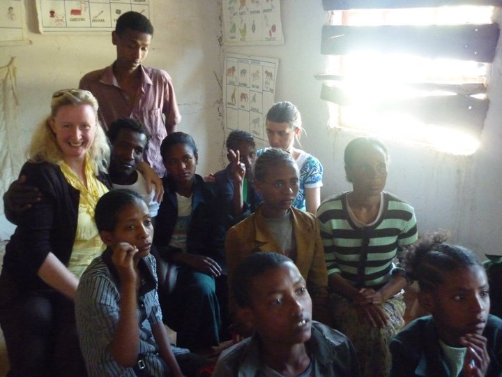 Deaf students in an old classroom, before the new school opened.
