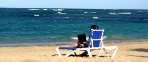 Laptop Lifestyle - Sharon working on the beach